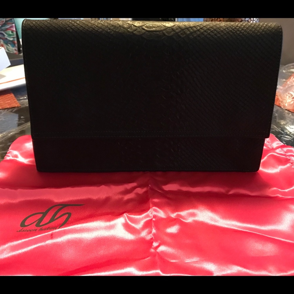 Darren Hakim Le Roma Black clutch. Brand new